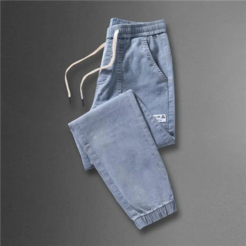 2023 Spring and Autumn New Classic Fashion Solid Color Haren Pants Men's Casual Slim Comfortable Elastic High Quality Jeans 5XL